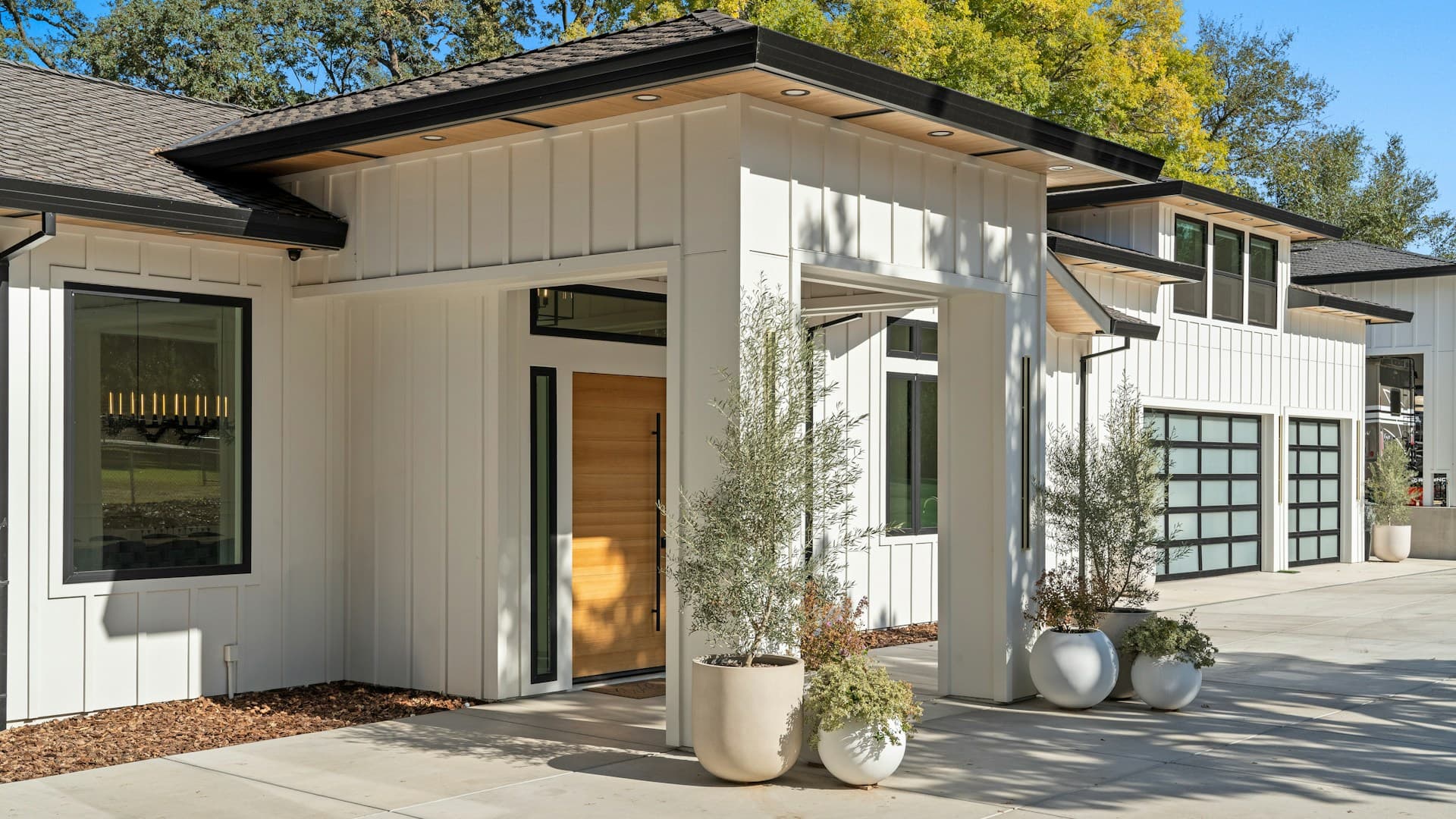 Modern luxury home with beautiful garage doors